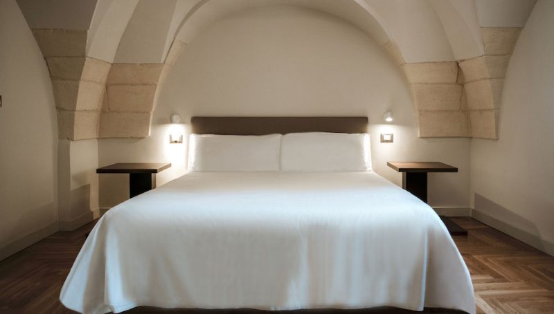 Le suite di Palazzo dei Tolomei - il letto matrimoniale